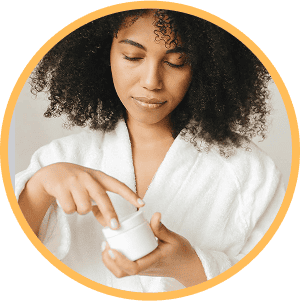 Person using anaesthetic cream to reduce pain after PRP therapy